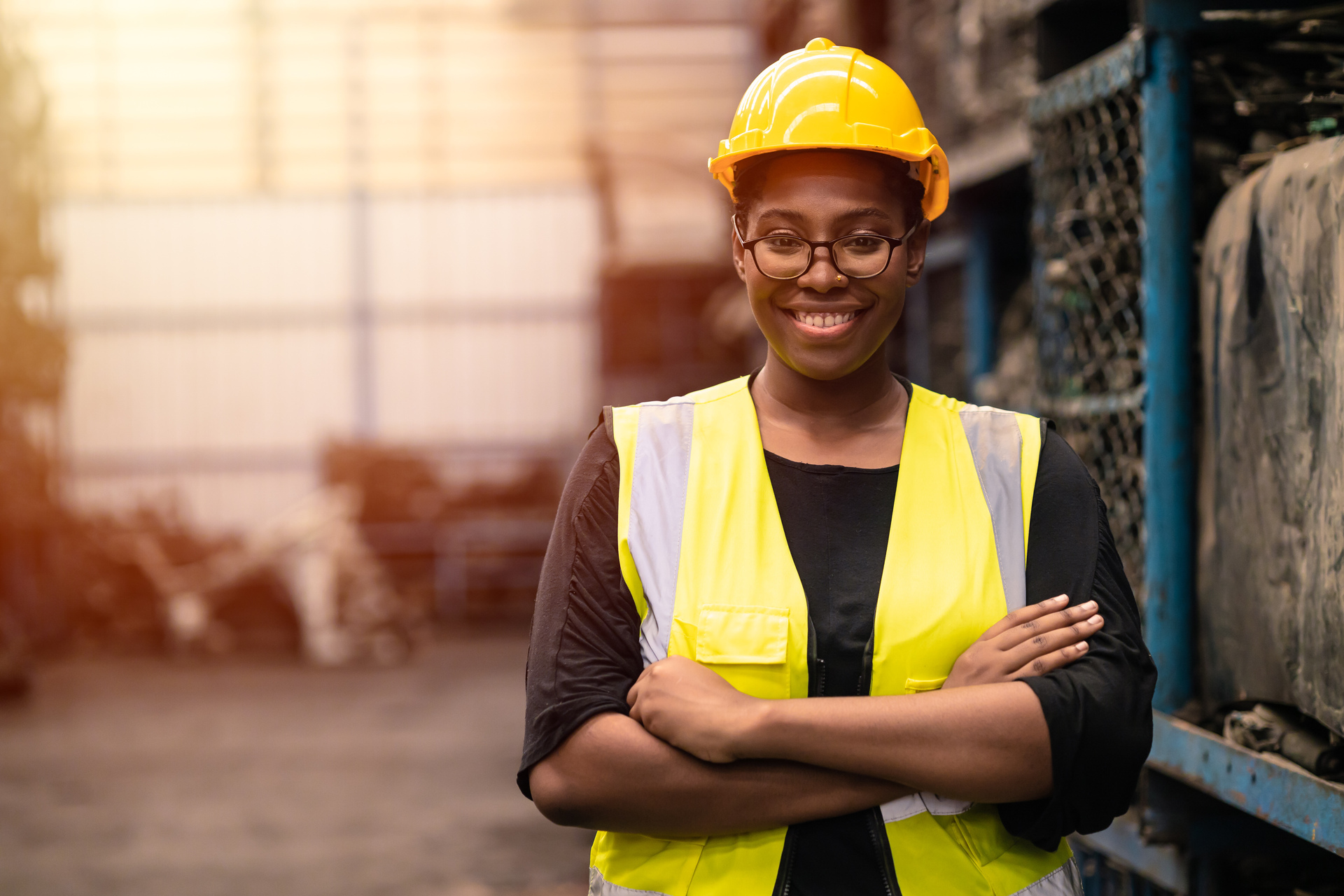 Portrait Black smart African women worker standing happy smiling in factory industry workplace